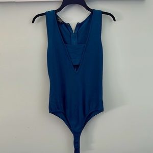 Bebe Blue Bodysuit with Front Cutout Size Large